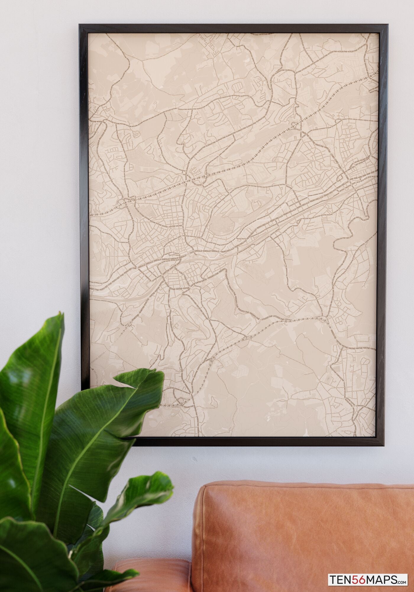 Poster hanging over couch in Sand color scheme