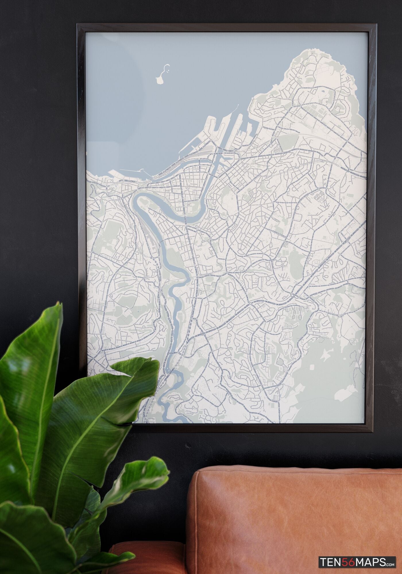 Poster hanging over couch in Earth color scheme