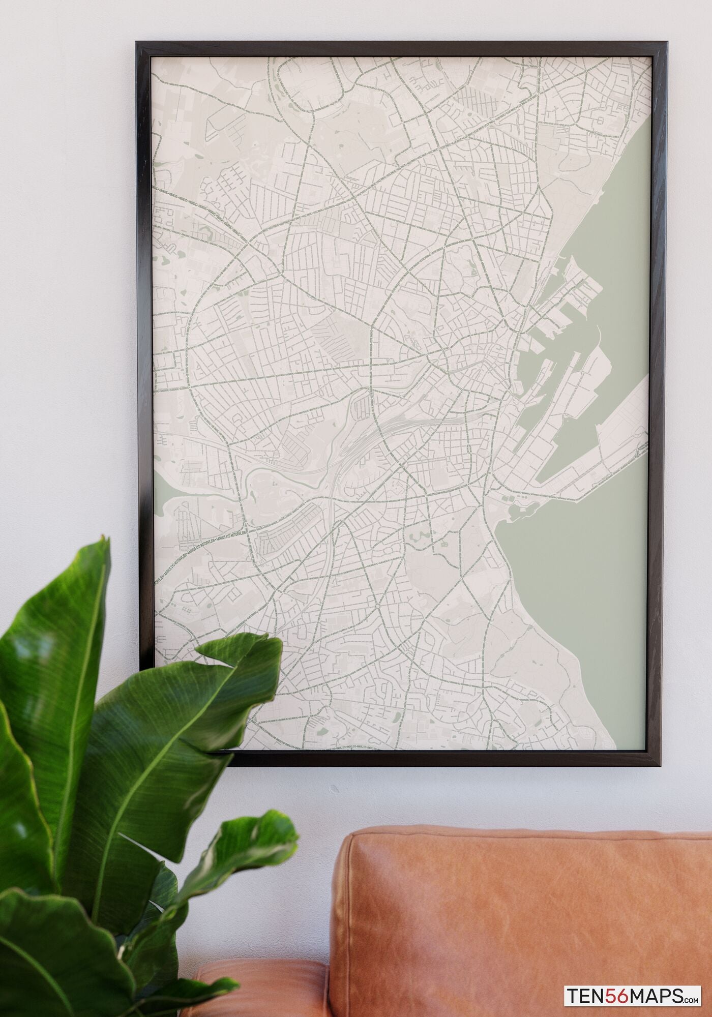 Poster hanging over couch in Mint color scheme