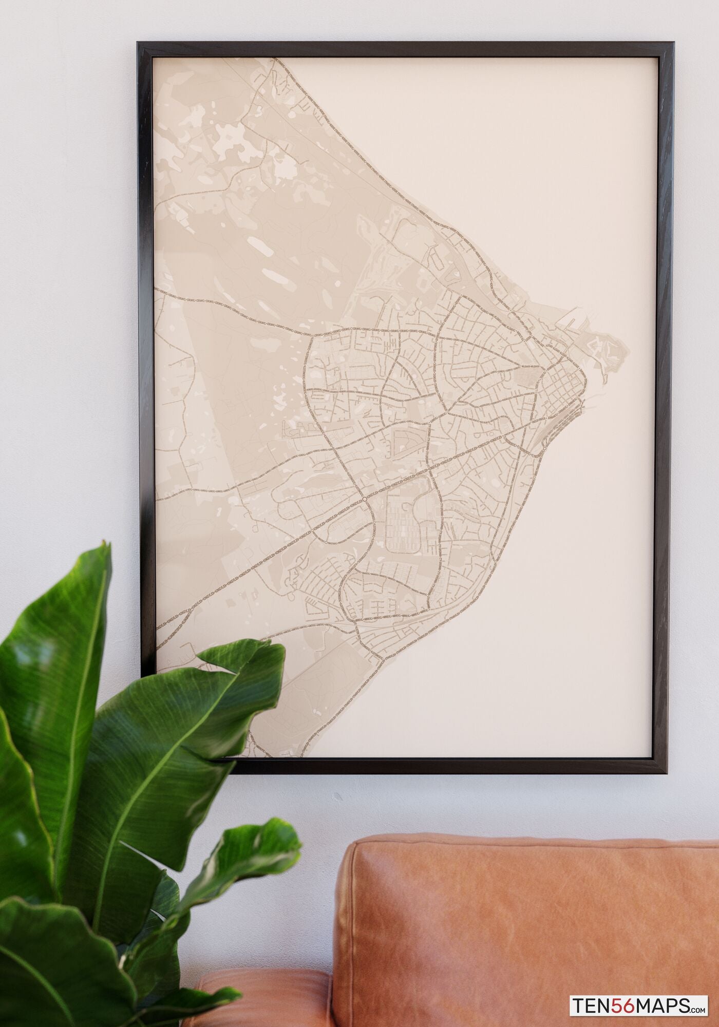 Poster hanging over couch in Sand color scheme