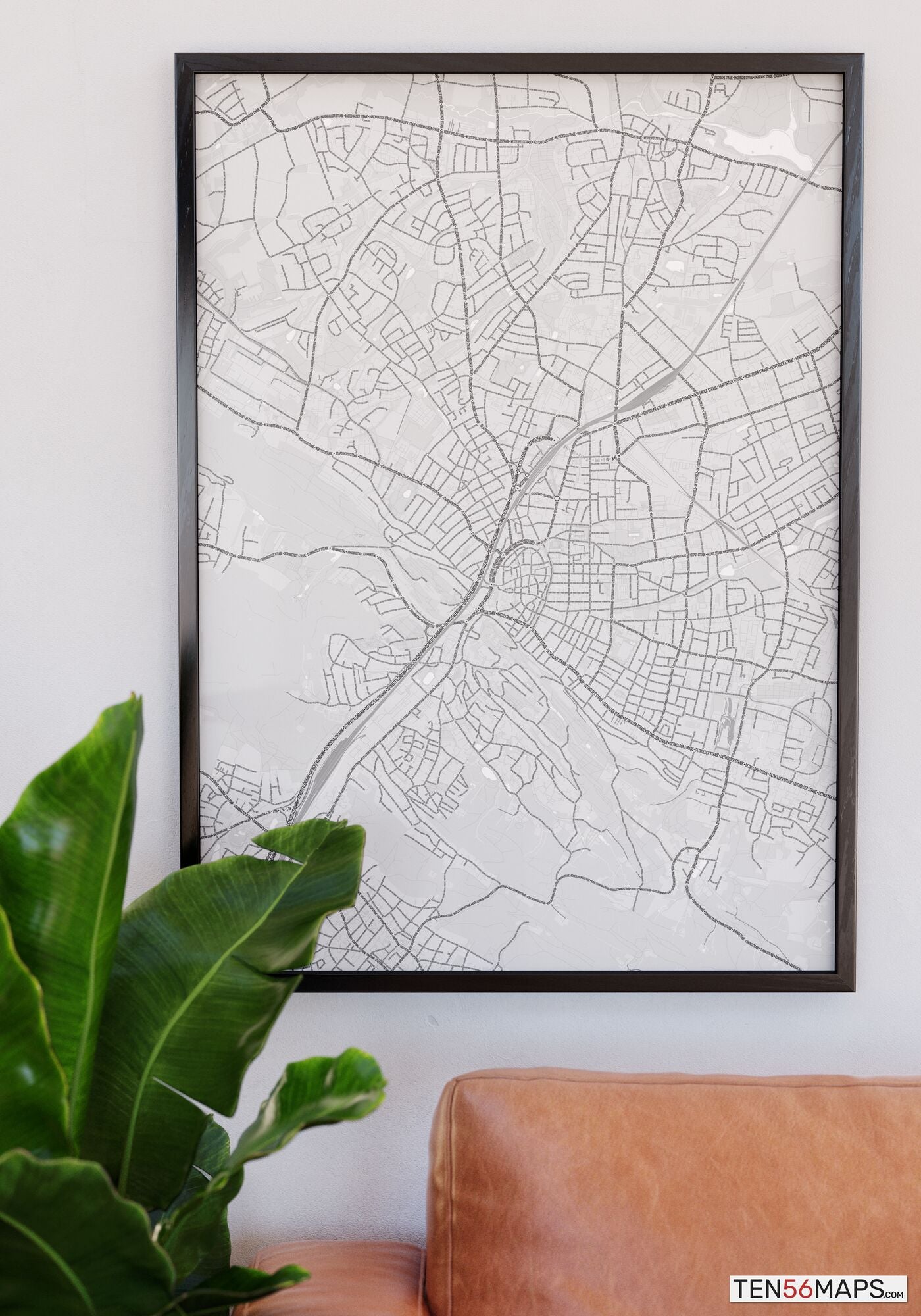 Poster hanging over couch in Gray color scheme