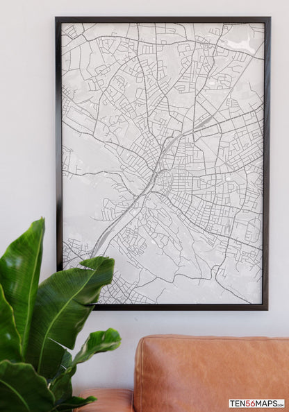 Poster hanging over couch in Gray color scheme