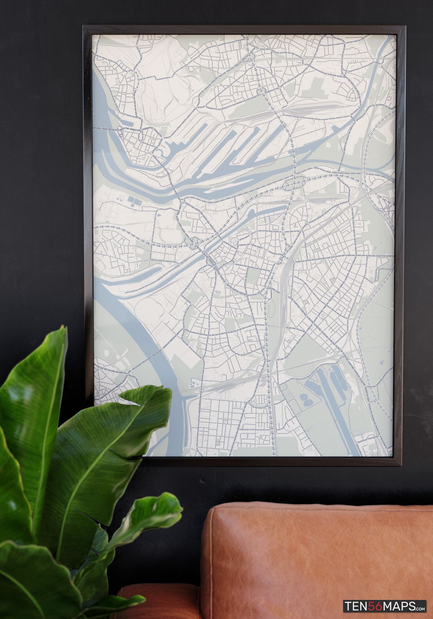 Poster hanging over couch in Earth color scheme