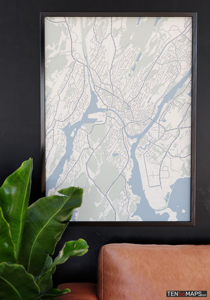 Poster hanging over couch in Earth color scheme