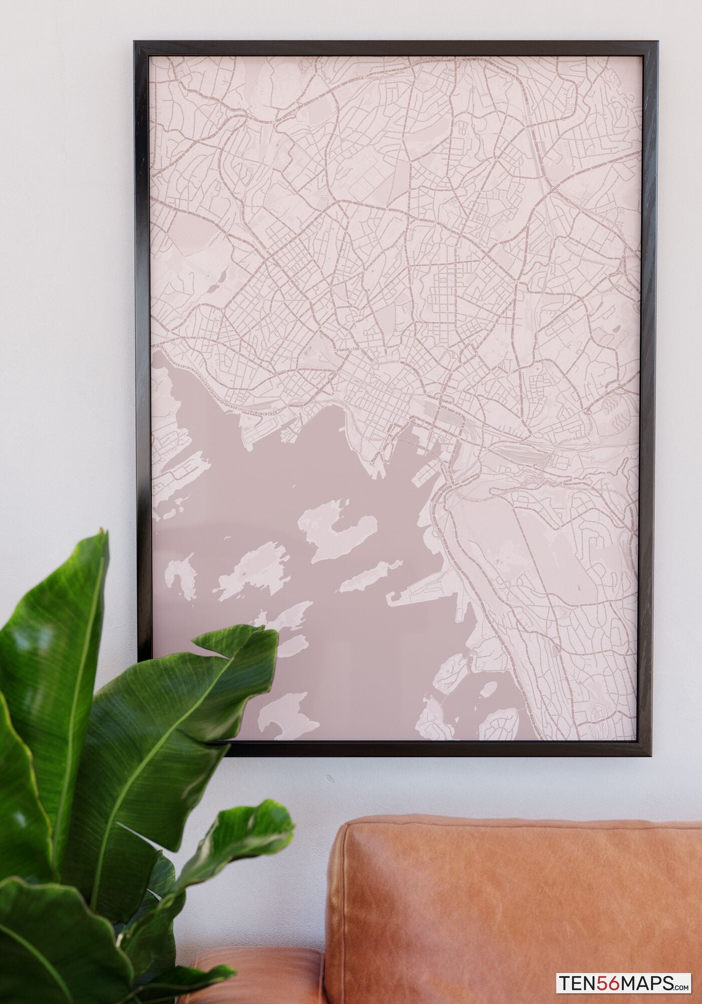 Poster hanging over couch in Rose color scheme